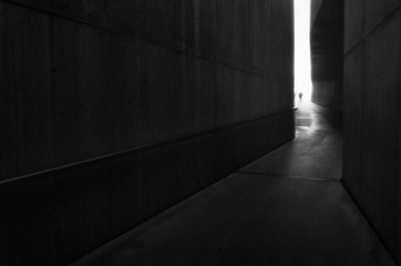 Person isolated on architectural elements, Black and White Photo.