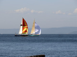 Two yachts sailing on the sea