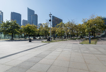 Panoramic skyline and buildings with empty concrete square floor，Qianjiang New Town，hangzhou,china