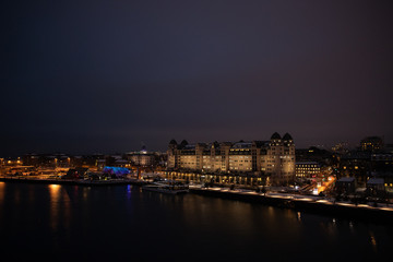 Overlooking the city center of Oslo Norway during the winter all covered with fresh snow during the evening time