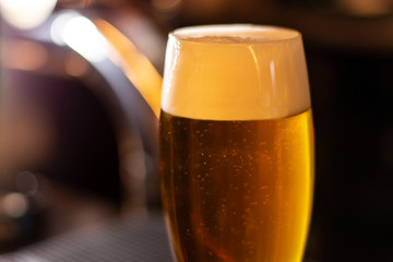 a glass of cold beer closeup