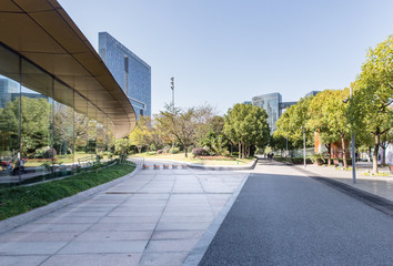 Panoramic skyline and buildings with empty concrete square floor，Qianjiang New...