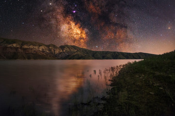Fototapeta na wymiar Milky way galaxy on the lake. Night landscape. 