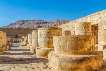 Ancient Egyptian temple Amon Ra in Luxor with columns and beautiful bas-reliefs Pharaoh's cult