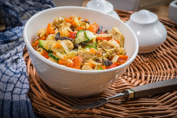 Fried chicken pieces with vegetables.