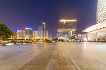 Fototapeta na wymiar Panoramic skyline and buildings with empty concrete square floor，Qianjiang New Town，hangzhou,china