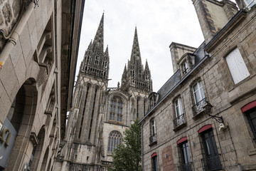 Fototapeta na wymiar Quimper, France. Views of the two towers of the Gothic Cathedral of Saint Corentin, a Roman Catholic cathedral and national monument of Brittany