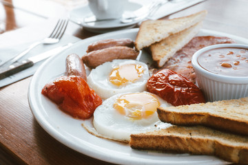 Egg and Toast - classical english breakfast with egg and ham
