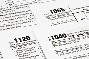 The tax forms with  money and the pen. Tax Day concept