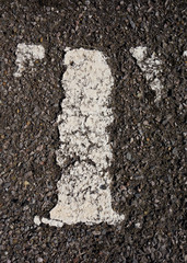 Written Wording in Distressed State Typography Found Letter T