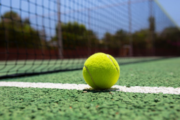 Tennis ball on a outdoor court