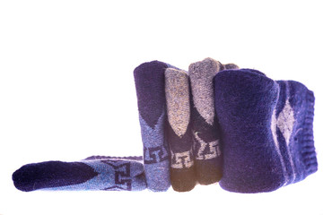 Stack of camel socks isolated on white background.