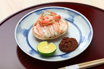 Seko gani, steamed female snow crab meat and egg stuffed on crab shell, Japanese food
