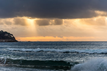 Rays of Light Shining Down on a Hill Along the Southern Italian Mediterranean Coast