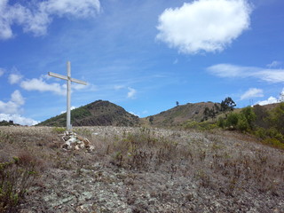 Fototapeta na wymiar A cross high on a mountain near Suesca, Colombia