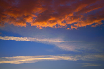 Fototapeta na wymiar Sunset sky clouds orange and blue