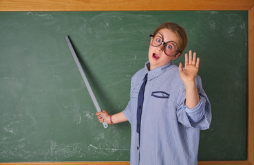 Funny kid girl at school teacher costume
