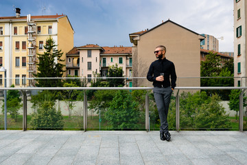 Man drinking a whiskey in Milan