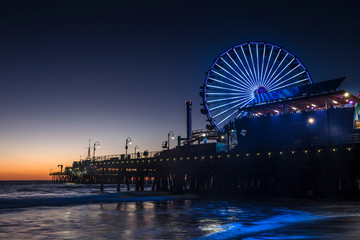 The Santa Monica Pier at sunset, in Santa Monica, California.