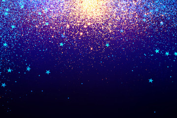 Gold falling sparkles in blue