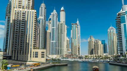 Fototapeta na wymiar View of Dubai Marina Towers and canal in Dubai timelapse hyperlapse