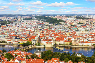 Fototapeta na wymiar Charles bridge over the Vltava river and Old Town of Prague sigh