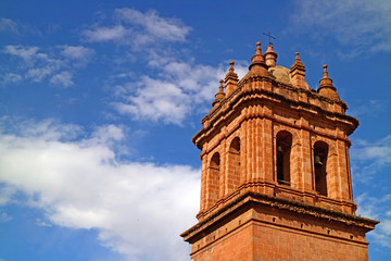 Fototapeta na wymiar The Belfry of Cathedral Basilica of the Assumption of the Virgin Against Sunny Sky, Cusco, Peru, South America 