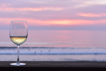 Glass of wine at sunset