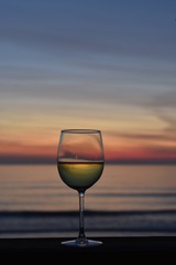Glass of wine at sunset