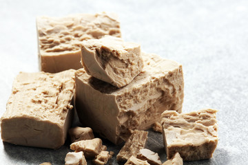 Dry yeast crumbled and yeast block for baking