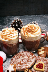 Hot chocolate cocoa with whipped cream for xmas on table
