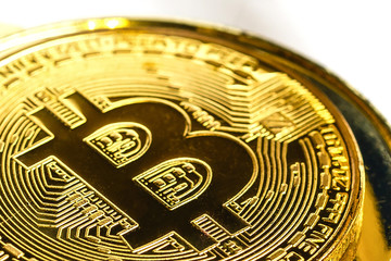 Fototapeta na wymiar Golden bitcoin isolated on white background