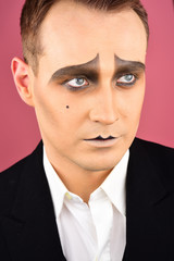 Serious and genuine. Drama or tragedian performer. Theatre actor miming. Mime with face paint. Mime...