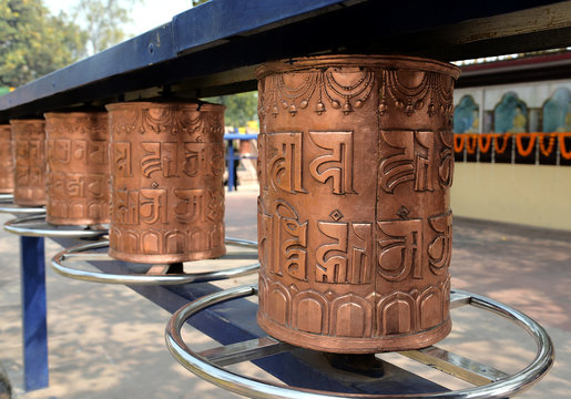 Copper prayer wheels in Sarnath, India, where Buddha gave his first sermon.