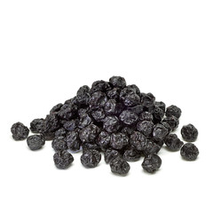 Sun dried blueberries heap or pile isolated on white background