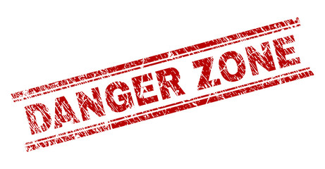 DANGER ZONE seal print with corroded texture. Red vector rubber print of DANGER ZONE tag with retro texture. Text caption is placed between double parallel lines.