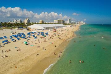 Aerial photo crowds of people in Miami Beach december vacation