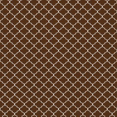 Quatrefoil Seamless Pattern - Graphic brown and white quatrefoil or trellis design