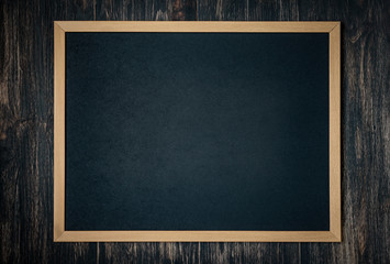 chalk board on a wooden background