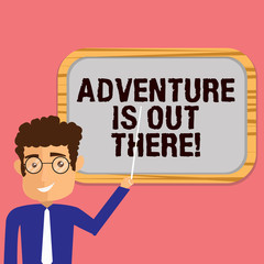 Conceptual hand writing showing Adventure Is Out There. Business photo showcasing Explore discover travel know new interesting things Man Holding Stick Pointing to Wall Mounted Blank Color Board