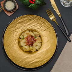 Tortellini with cream sauce and ham. Italian tortellini pasta with cream sauce and ham. Tortellini, panna e prosciutto cotto. 