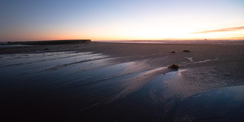Twilight evening sunset over Santa Clara River tidal outflow to Pacific Ocean at McGrath State Park on the California Gold Coast at Ventura - United States
