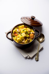 Navratan Korma is a rich, creamy and flavorful Mughlai dish  from India that literally translates to nine-gem curry. The “gems” are the fruits, vegetables and nuts that make up the curry. 