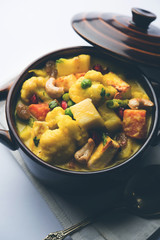 Navratan Korma is a rich, creamy and flavorful Mughlai dish  from India that literally translates to nine-gem curry. The “gems” are the fruits, vegetables and nuts that make up the curry. 