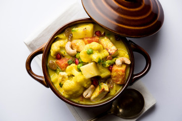 Navratan Korma is a rich, creamy and flavorful Mughlai dish  from India that literally translates to nine-gem curry. The “gems” are the fruits, vegetables and nuts that make up the curry. 