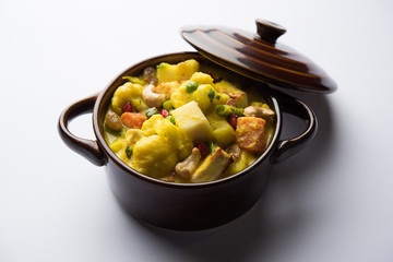 Navratan Korma is a rich, creamy and flavorful Mughlai dish  from India that literally translates to nine-gem curry. The “gems” are the fruits, vegetables and nuts that make up the curry. 