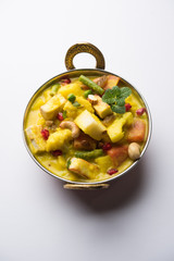 Navratan Korma is a rich, creamy and flavorful Mughlai dish  from India that literally translates to nine-gem curry. The “gems” are the fruits, vegetables and nuts that make up the curry. 