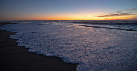 Evening sunset over Santa Clara River tidal outflow to Pacific Ocean at McGrath State Park on the California Gold Coast at Ventura - United States