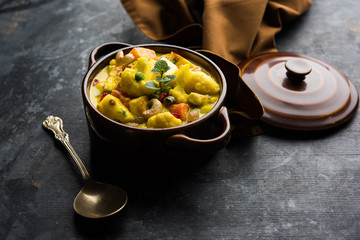 Navratan Korma is a rich, creamy and flavorful Mughlai dish  from India that literally translates to nine-gem curry. The “gems” are the fruits, vegetables and nuts that make up the curry. 