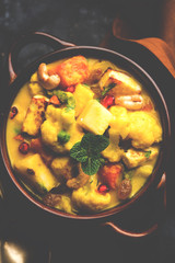 Navratan Korma is a rich, creamy and flavorful Mughlai dish  from India that literally translates to nine-gem curry. The “gems” are the fruits, vegetables and nuts that make up the curry. 